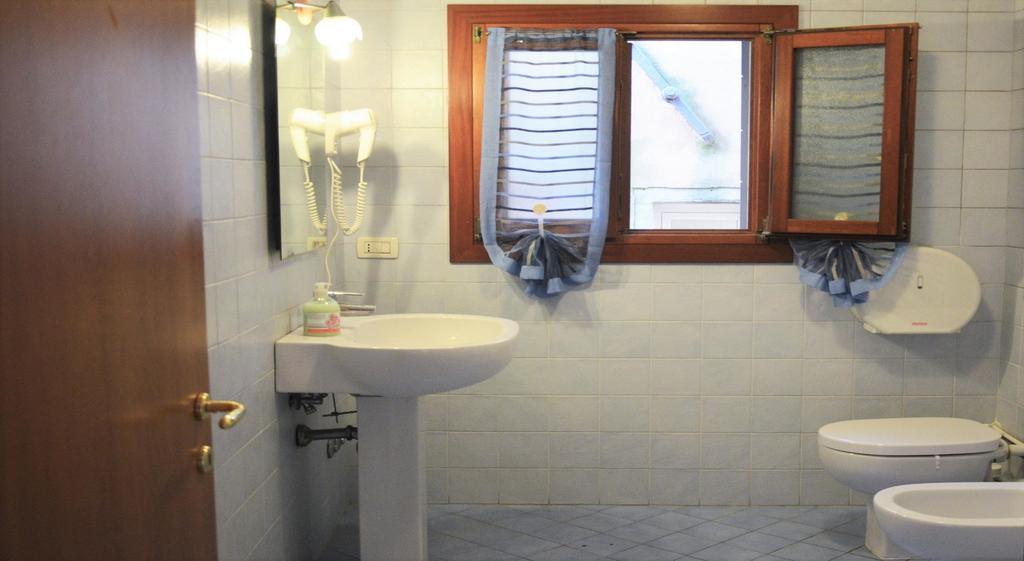 Habitación Triple con baño compartido
